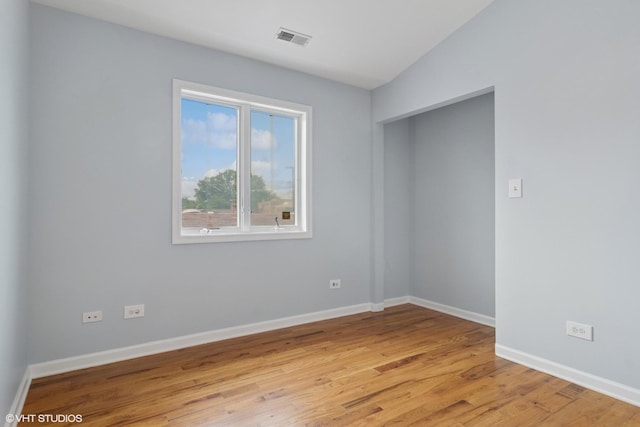7032 W 63rd Pl, Chicago, IL 60638 - empty room featuring light wood-style flooring and baseboards