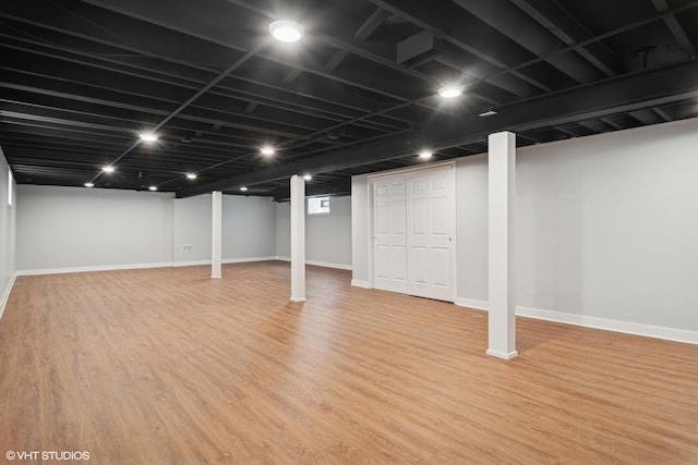 7032 W 63rd Pl, Chicago, IL 60638 - finished basement featuring wood finished floors and baseboards