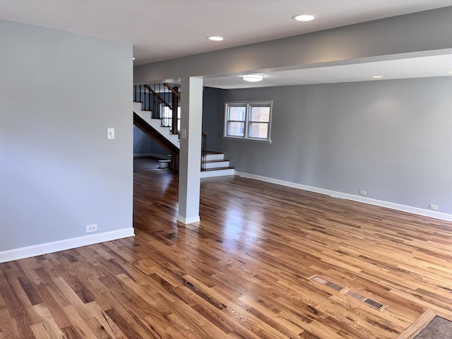 7032 W 63rd Pl, Chicago, IL 60638 - spare room featuring wood finished floors, stairs, and recessed lighting