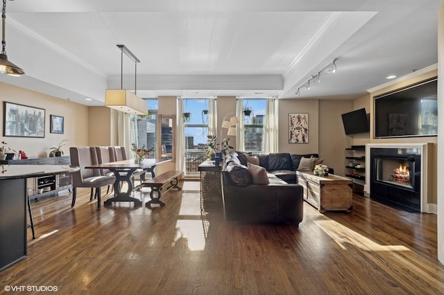 165 N Canal St Unit 1231, Chicago, IL 60606 - living room with track lighting, crown molding, wood finished floors, a warm lit fireplace, and a wall of windows