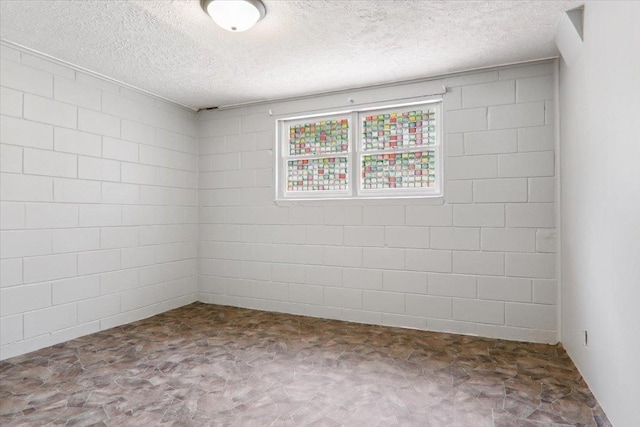 1209 Gettysburg Dr, Bloomington, IL 61704 - unfurnished room with a textured ceiling