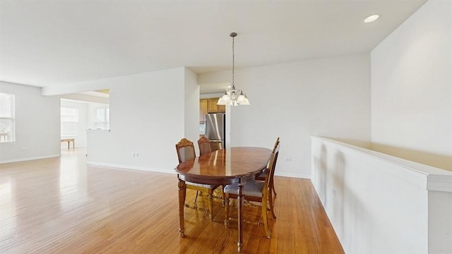 3201 Rockwell Cir, Mundelein, IL 60060 - dining area with light wood-type flooring, a chandelier, and recessed lighting
