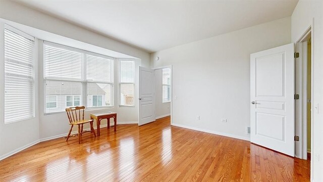 3201 Rockwell Cir, Mundelein, IL 60060 - spare room featuring light wood finished floors