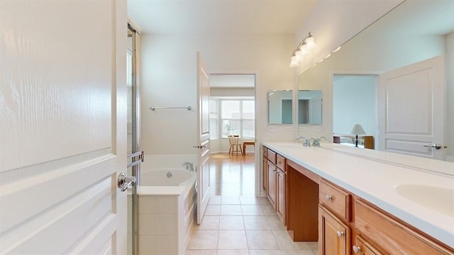 3201 Rockwell Cir, Mundelein, IL 60060 - full bath with double vanity, a garden tub, and tile patterned floors