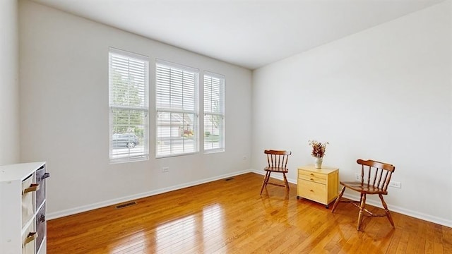 3201 Rockwell Cir, Mundelein, IL 60060 - sitting room with light wood-style flooring and baseboards