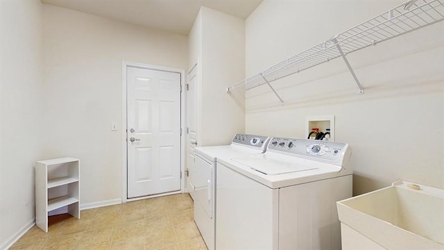 3201 Rockwell Cir, Mundelein, IL 60060 - laundry area with separate washer and dryer and baseboards