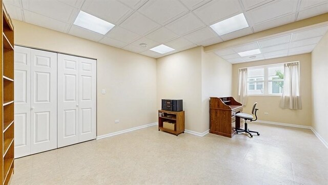 3201 Rockwell Cir, Mundelein, IL 60060 - home office with a paneled ceiling and tile patterned floors