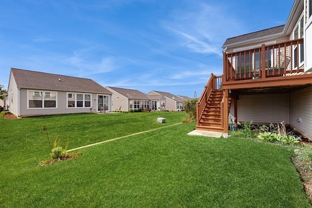3201 Rockwell Cir, Mundelein, IL 60060 - view of grassy yard featuring stairs and a wooden deck