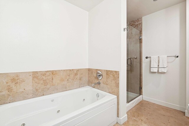 737 W Washington Blvd Unit 3308, Chicago, IL 60661 - bathroom with a whirlpool tub and a stall shower