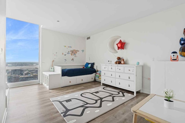737 W Washington Blvd Unit 3308, Chicago, IL 60661 - bedroom featuring wood finished floors