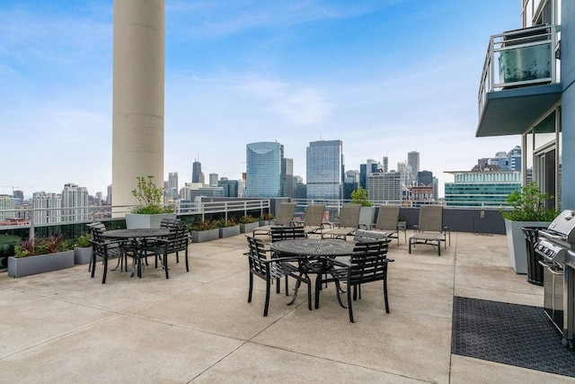 737 W Washington Blvd Unit 3308, Chicago, IL 60661 - view of patio featuring a skyline view and outdoor dining space