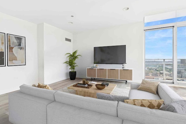 737 W Washington Blvd Unit 3308, Chicago, IL 60661 - living room with wood finished floors and recessed lighting