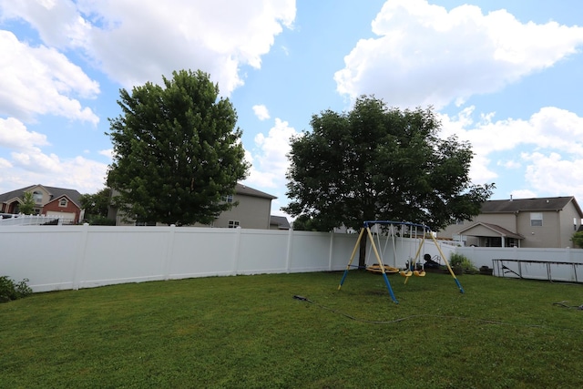 1053 Sycamore St, Beecher, IL 60401 - fenced backyard featuring a playground