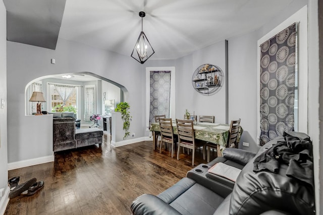4251 W Jackson Blvd, Chicago, IL 60624 - living area with arched walkways and wood-type flooring