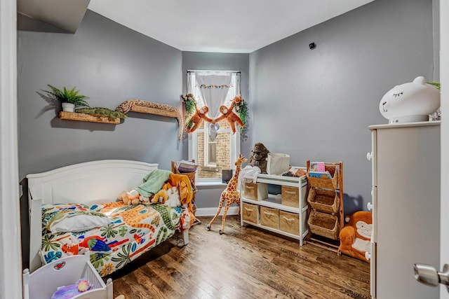 4251 W Jackson Blvd, Chicago, IL 60624 - bedroom featuring wood finished floors and baseboards
