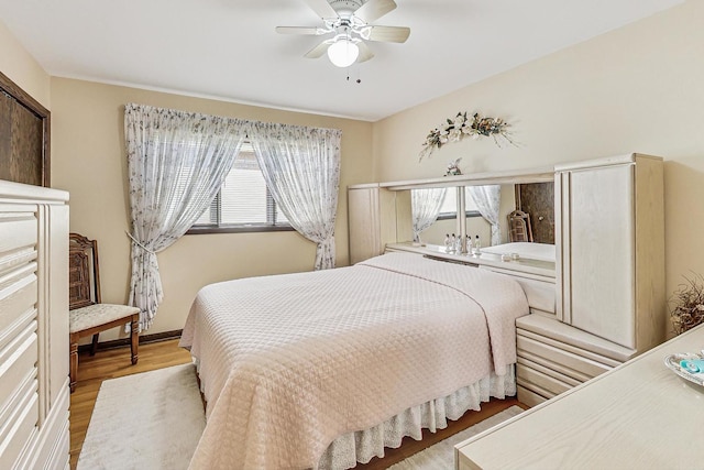 11531 S S Ave J, Chicago, IL 60617 - bedroom featuring wood finished floors and ceiling fan