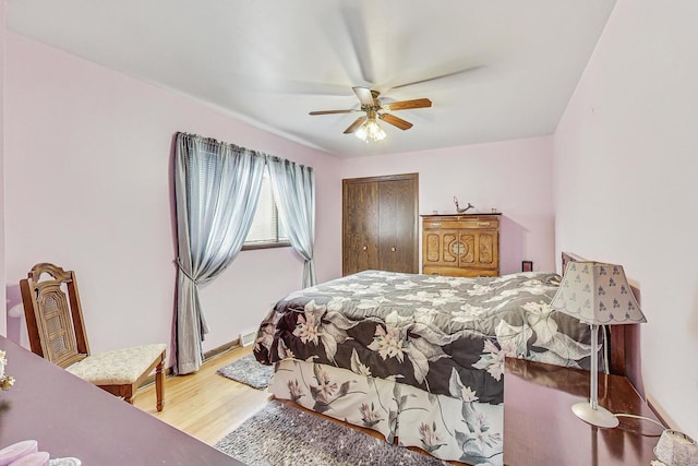 11531 S S Ave J, Chicago, IL 60617 - bedroom with wood finished floors, a closet, and ceiling fan