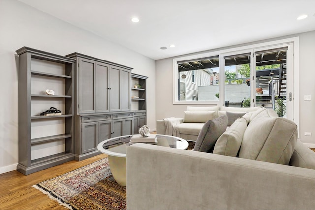 874 N Marshfield Ave Unit 1, Chicago, IL 60622 - living area with light wood-style floors and recessed lighting
