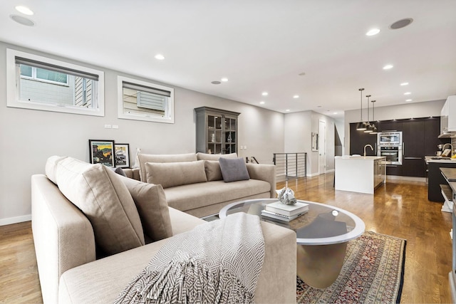 874 N Marshfield Ave Unit 1, Chicago, IL 60622 - living room featuring light wood finished floors and recessed lighting