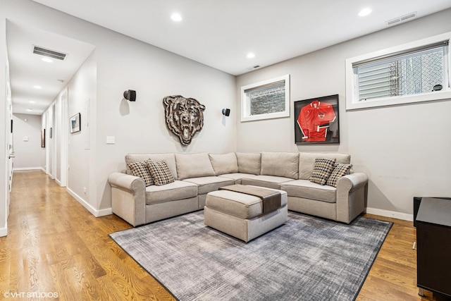 874 N Marshfield Ave Unit 1, Chicago, IL 60622 - living room featuring light wood-style floors and recessed lighting