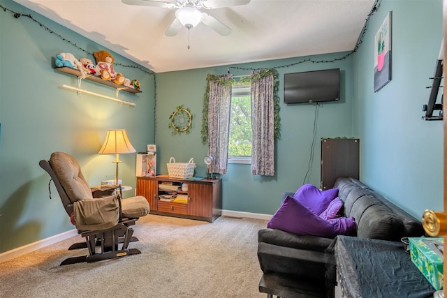 107 W 10th St, Gridley, IL 61744 - living area featuring carpet and ceiling fan