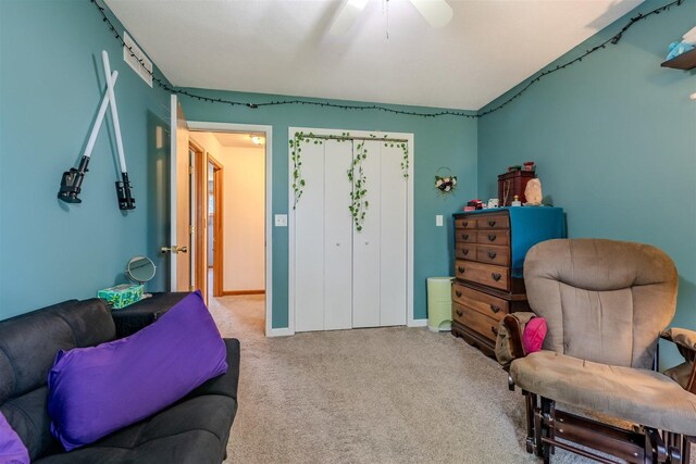 107 W 10th St, Gridley, IL 61744 - living area with carpet and a ceiling fan