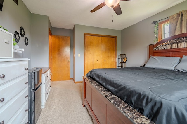 107 W 10th St, Gridley, IL 61744 - bedroom featuring light colored carpet, a closet, and ceiling fan