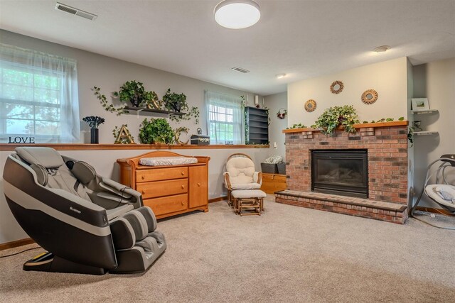 107 W 10th St, Gridley, IL 61744 - living room with carpet and a fireplace