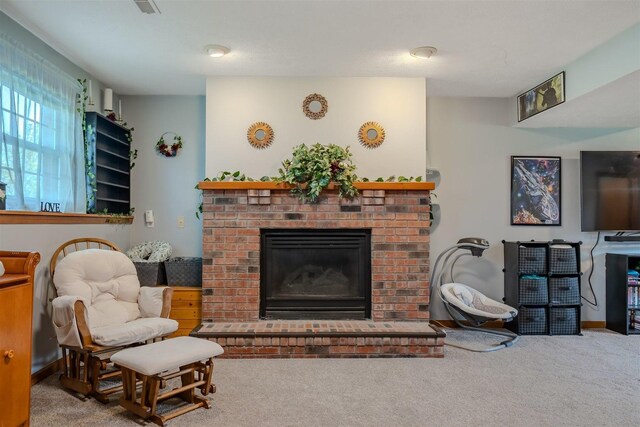 107 W 10th St, Gridley, IL 61744 - carpeted living area featuring a fireplace