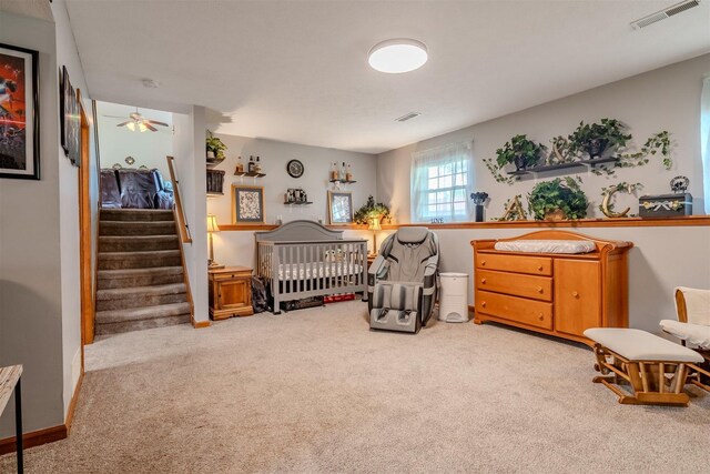 107 W 10th St, Gridley, IL 61744 - sitting room with carpet floors and stairway