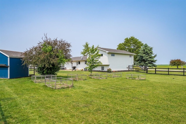 107 W 10th St, Gridley, IL 61744 - view of yard with a vegetable garden