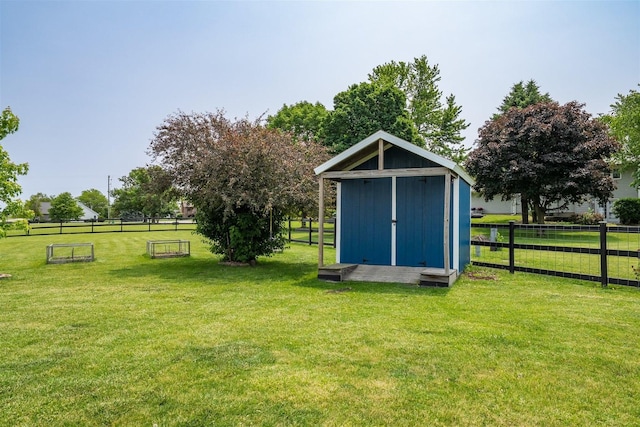 107 W 10th St, Gridley, IL 61744 - view of yard featuring a storage unit