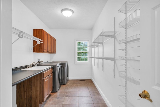 1904 Mullikin Dr, Champaign, IL 61822 - washroom featuring washing machine and clothes dryer, cabinet space, and a textured ceiling