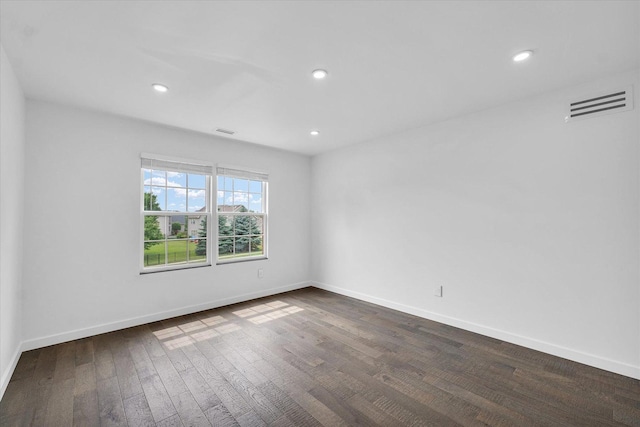 1904 Mullikin Dr, Champaign, IL 61822 - spare room with dark wood-type flooring and recessed lighting