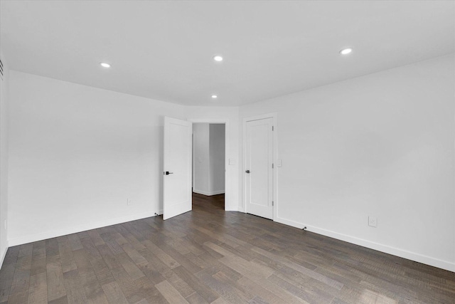1904 Mullikin Dr, Champaign, IL 61822 - spare room with wood finished floors and recessed lighting