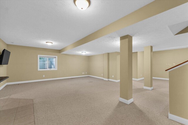 1904 Mullikin Dr, Champaign, IL 61822 - basement with a textured ceiling and light carpet