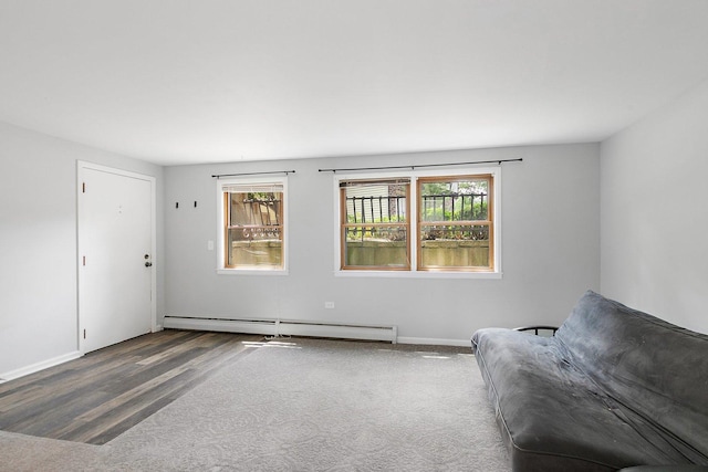 844 Village Quarter Rd Unit A5, West Dundee, IL 60118 - sitting room featuring baseboard heating and wood finished floors