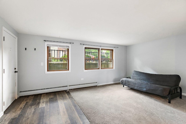 844 Village Quarter Rd Unit A5, West Dundee, IL 60118 - living area with baseboard heating and wood finished floors