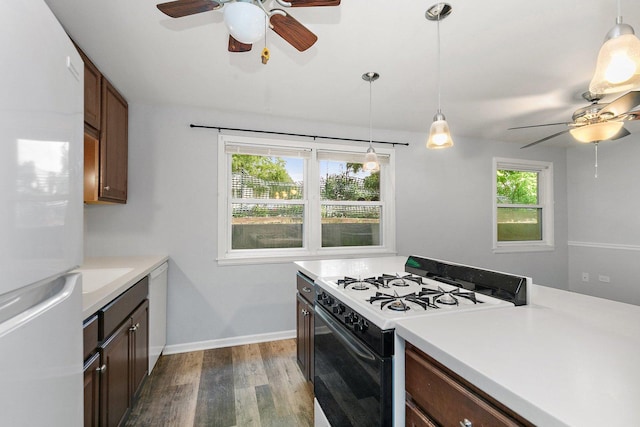 844 Village Quarter Rd Unit A5, West Dundee, IL 60118 - kitchen featuring white appliances, ceiling fan, dark wood-style flooring, and light countertops
