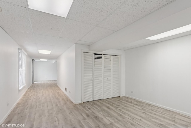 2855 Weld Rd, Elgin, IL 60124 - unfurnished bedroom with a paneled ceiling, wood finished floors, and a closet