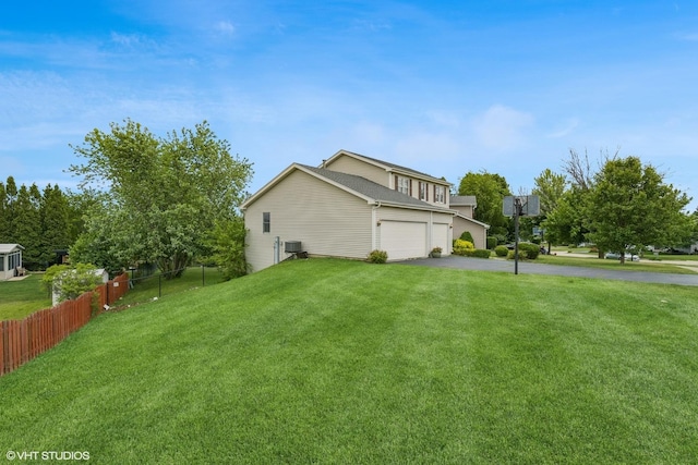 2855 Weld Rd, Elgin, IL 60124 - view of side of home featuring asphalt driveway and a garage
