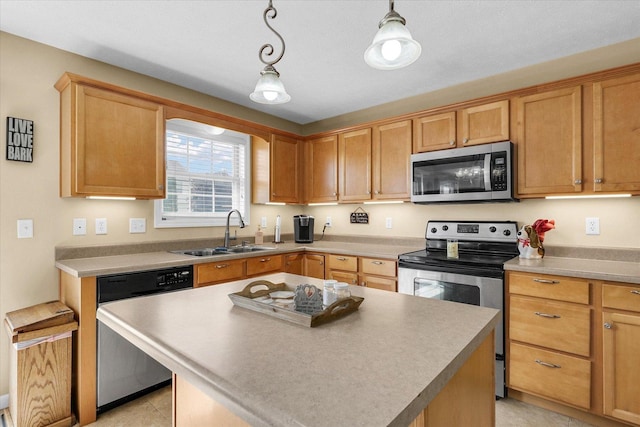 3911 Tallgrass Dr, Champaign, IL 61822 - kitchen with appliances with stainless steel finishes, pendant lighting, a kitchen island, and light countertops