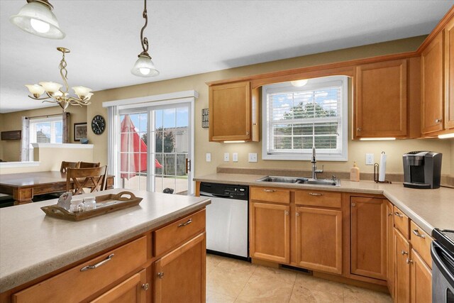 3911 Tallgrass Dr, Champaign, IL 61822 - kitchen featuring stainless steel appliances, a chandelier, decorative light fixtures, light countertops, and light tile patterned floors