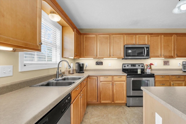 3911 Tallgrass Dr, Champaign, IL 61822 - kitchen with appliances with stainless steel finishes, light countertops, and light tile patterned flooring