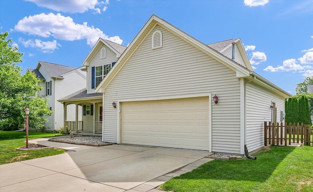 3911 Tallgrass Dr, Champaign, IL 61822 - view of front of property with concrete driveway, an attached garage, and a shingled roof