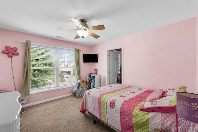 3911 Tallgrass Dr, Champaign, IL 61822 - carpeted bedroom featuring baseboards and ceiling fan