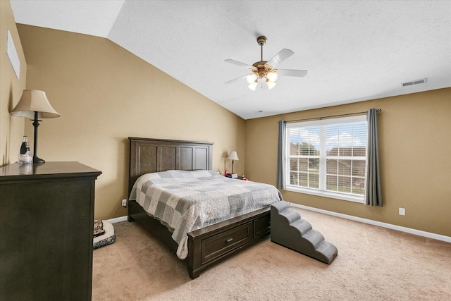 3911 Tallgrass Dr, Champaign, IL 61822 - bedroom with lofted ceiling, light colored carpet, and ceiling fan