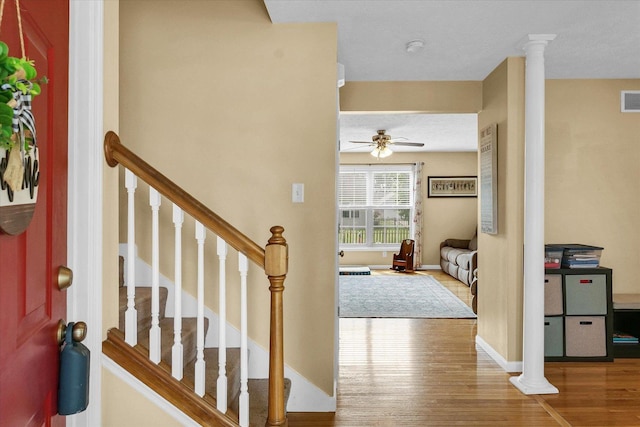 3911 Tallgrass Dr, Champaign, IL 61822 - foyer entrance with wood finished floors and ceiling fan