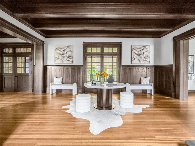 141 Loretto Ct, Wheaton, IL 60189 - dining area featuring a wainscoted wall, healthy amount of natural light, wood finished floors, and ornamental molding