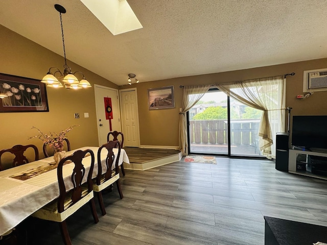11 Echo Ct Unit 17, Vernon Hills, IL 60061 - dining room with a textured ceiling, wood finished floors, lofted ceiling, a chandelier, and a skylight